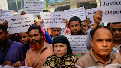 Bangladeshi workers who were employed by Malaysian companies protest in front of the Ministry of Expatriates' Welfare and Overseas Employment demanding unpaid wages, fair compensation and an end to alleged abuse by Malaysian employers, in Dhaka, Bangladesh, Monday, Nov. 10, 2025.