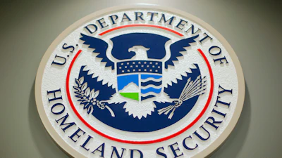 The Department of Homeland Security logo is seen during a news conference in Washington, Feb. 25, 2015.