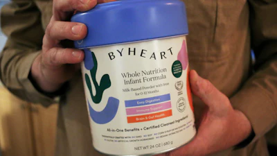 Stephen Dexter holds a container of ByHeart baby formula, which was recently recalled by ByHeart, in Flagstaff, Ariz., on Wednesday, Nov. 12, 2025.