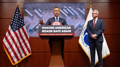 Transportation Secretary Sean Duffy speaks alongside Derek Barrs, administrator of the Federal Motor Carrier Safety Administration, during a news conference in Washington, Dec. 12, 2025.