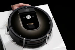 A Roomba 980 vacuum cleaning robot is presented during a presentation in Tokyo, on Sept. 29, 2015.