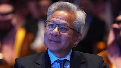 Nvidia CEO Jensen Huang listens as President Donald Trump speaks during the Saudi Investment Forum at the Kennedy Center, Wednesday, Nov. 19, 2025, in Washington.