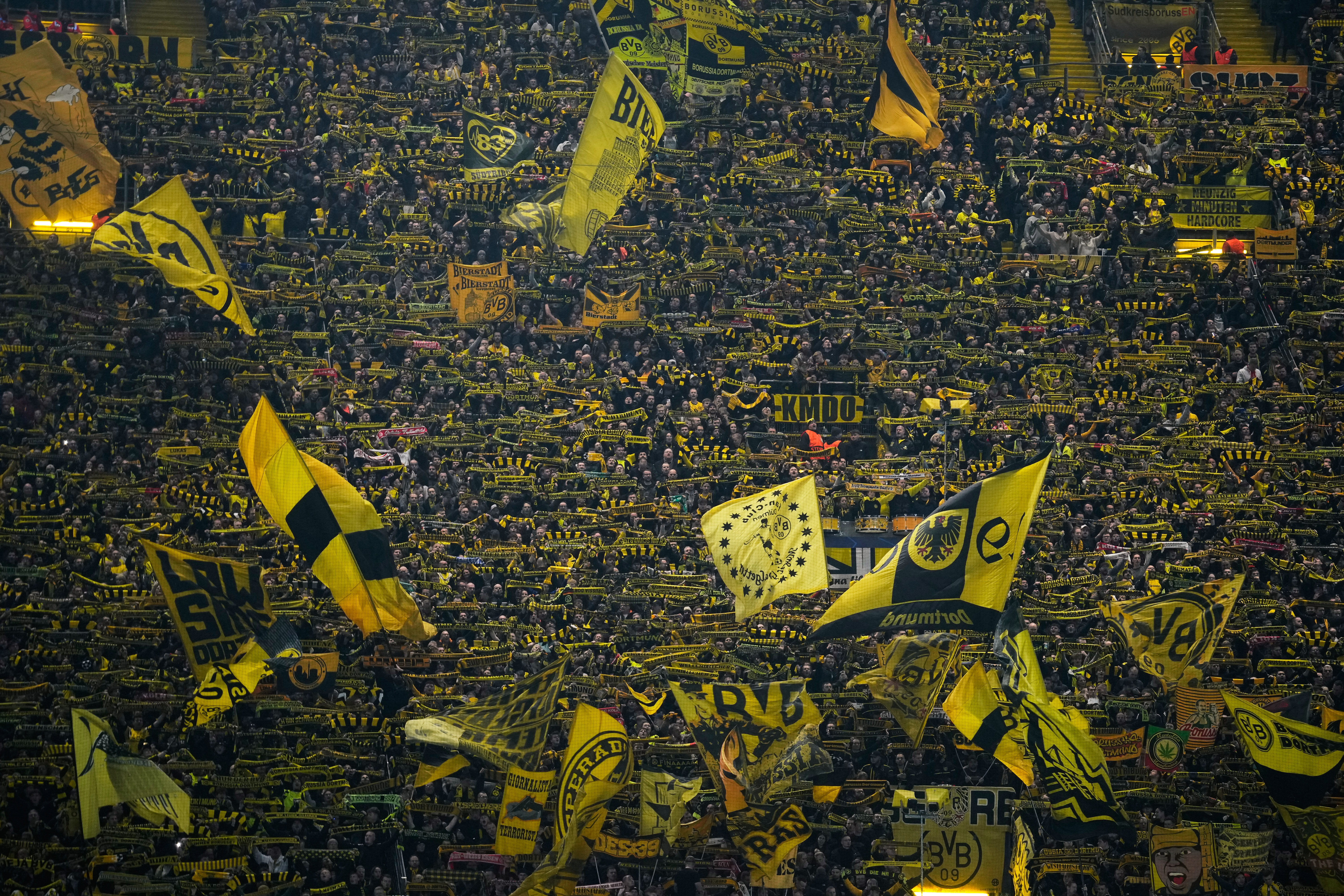 Borussia Dortmund supporters react ahead of the Champions League opening phase soccer match between Borussia Dortmund and Bodo Glimt in Dortmund, Germany, Wednesday, Dec. 10, 2025.