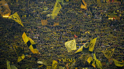 Borussia Dortmund supporters react ahead of the Champions League opening phase soccer match between Borussia Dortmund and Bodo Glimt in Dortmund, Germany, Wednesday, Dec. 10, 2025.