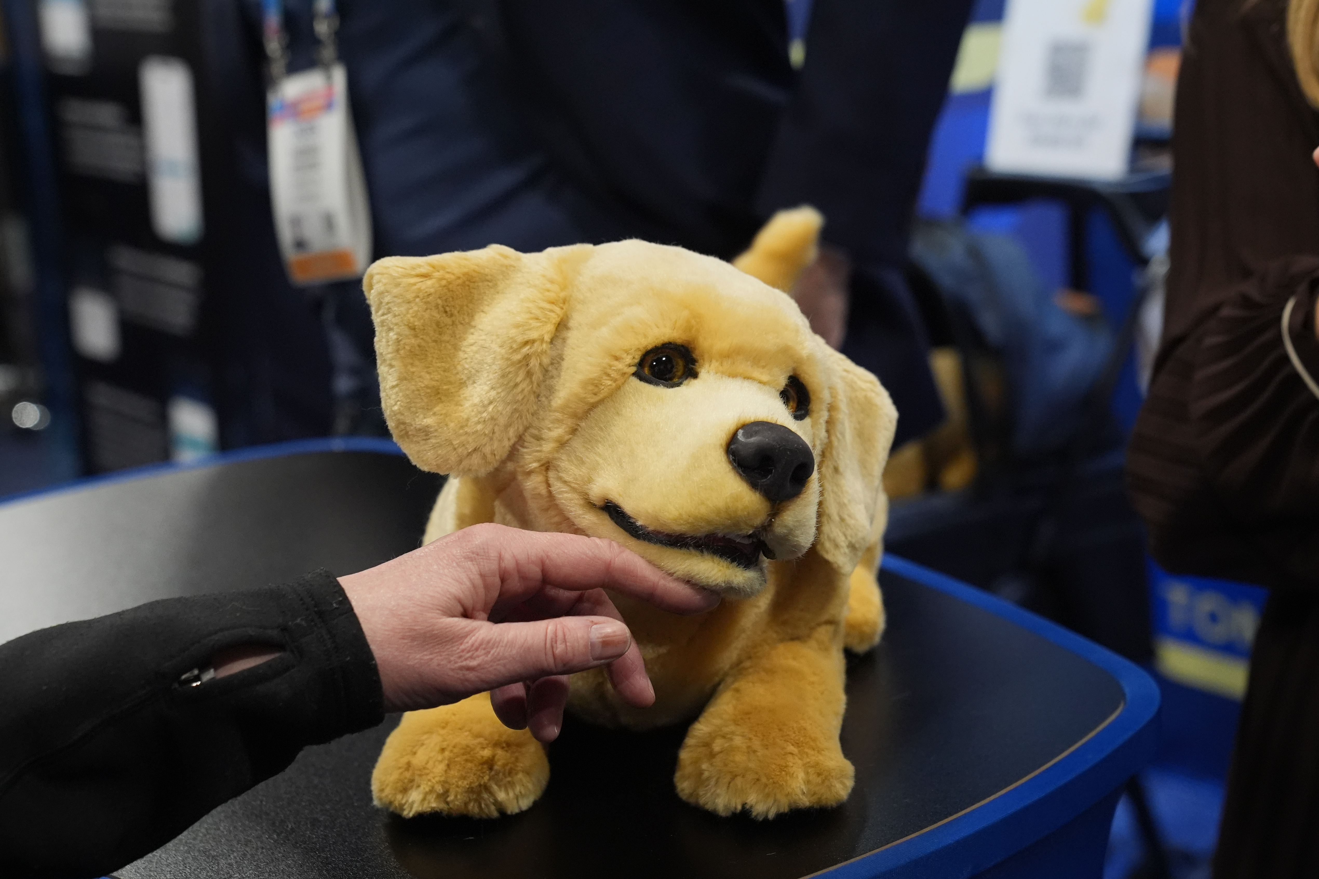 A Tombot robotic puppy is pictured at a Tombot booth during the CES Unveiled tech show Sunday, Jan. 4, 2026, in Las Vegas.
