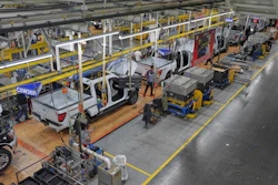 Employees work on the assembly line at the Ford River Rogue complex, Tuesday, Jan. 13, 2026, in Dearborn, Mich.