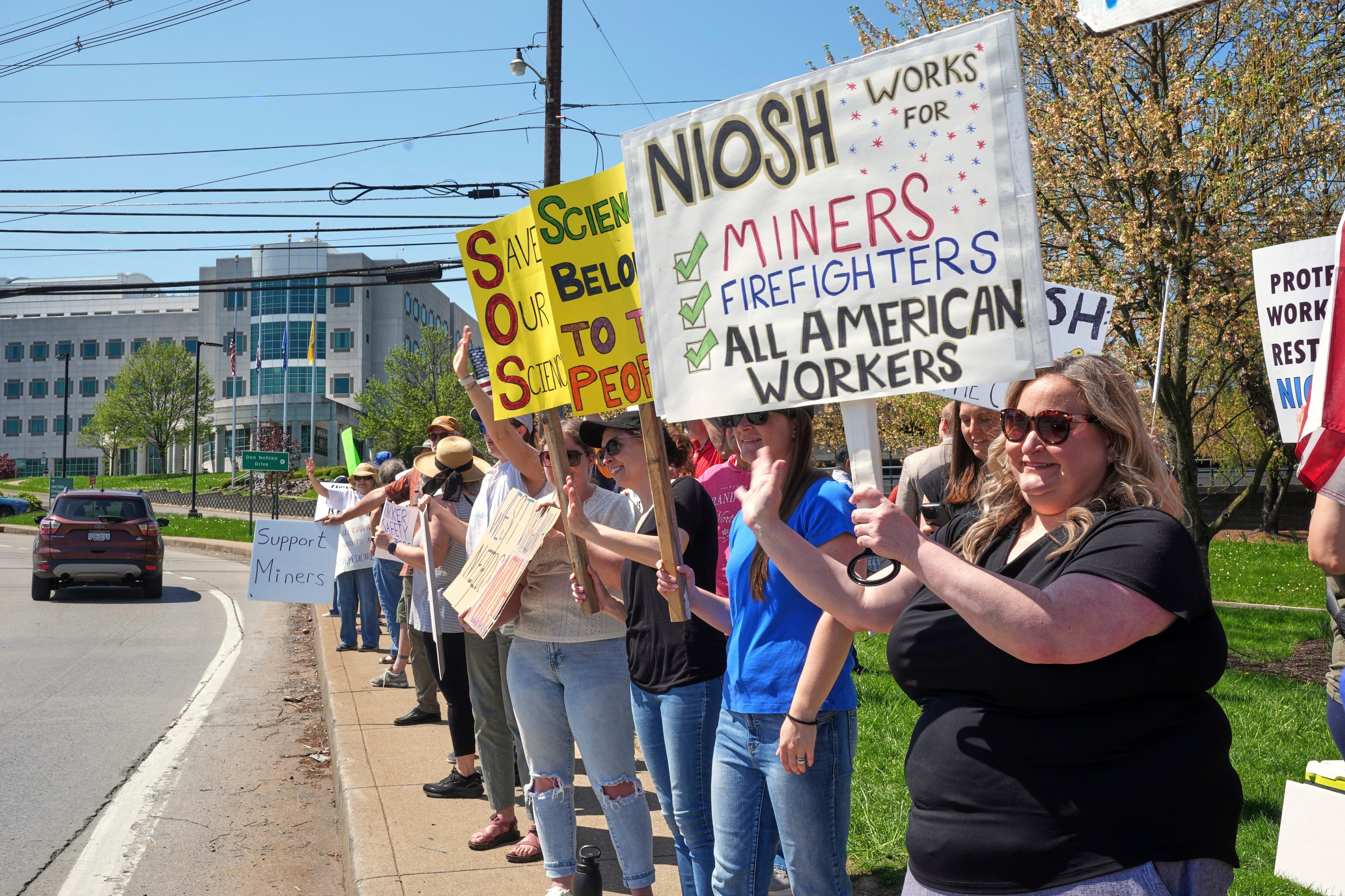 People rally on Wednesday, April 23, 2025.