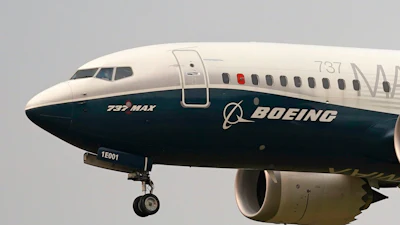 A Boeing 737 Max jet prepares to land at Boeing Field following a test flight in Seattle, Sept. 30, 2020.
