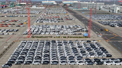 Aerial view of new cars waiting for shipment at a port in Shanghai, China, Wednesday, Jan. 14, 2026.