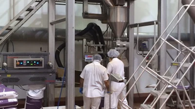 A RotoClone W dust extraction system from AAF International in use at an industrial facility.