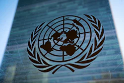The symbol of the United Nations is displayed outside the Secretariat Building, Feb. 28, 2022, at United Nations Headquarters.