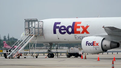 A FedEx cargo plane on the tarmac at Fort Lauderdale-Hollywood International Airport, Fort Lauderdale, Fla., April 20, 2021.