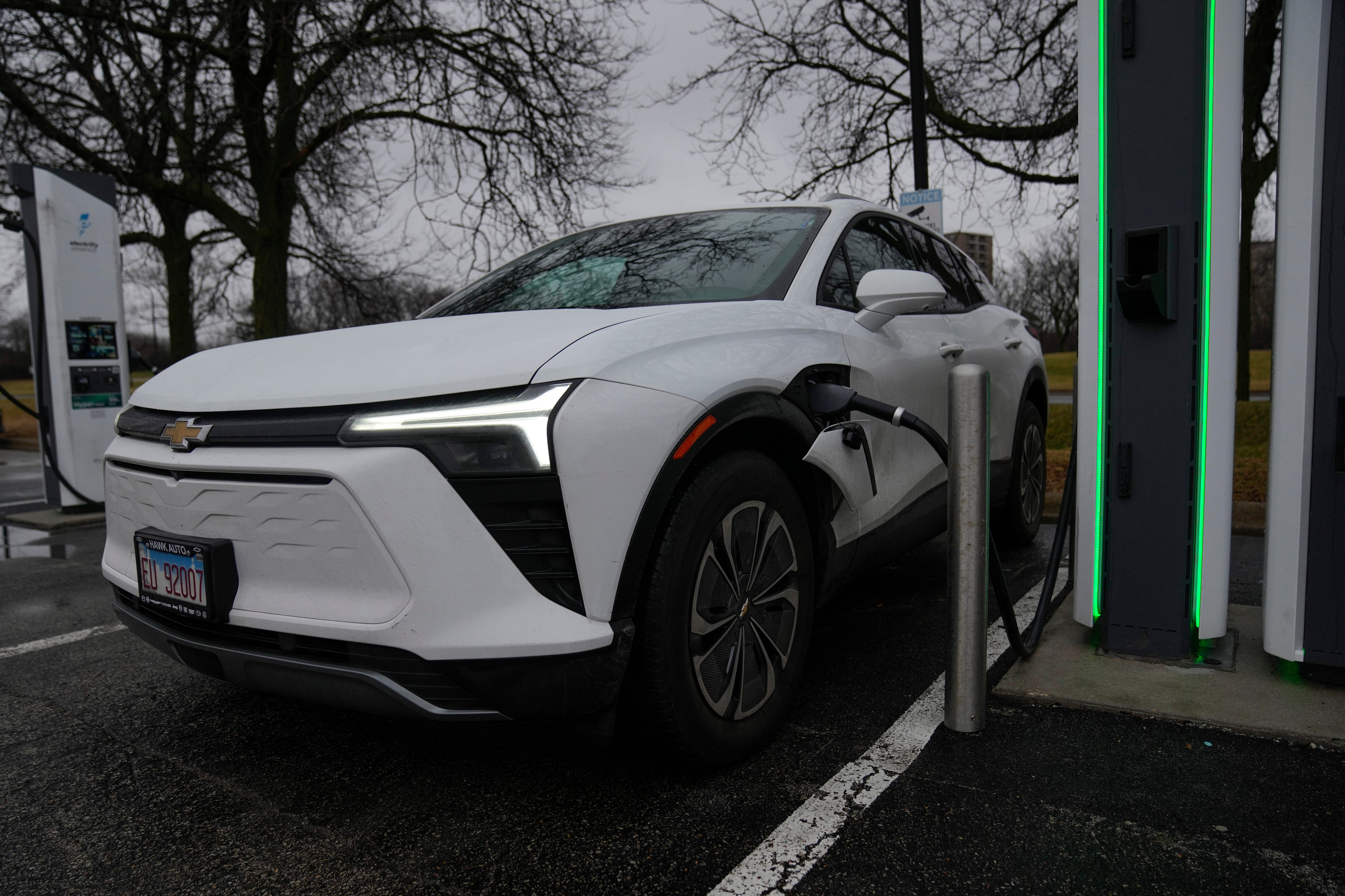 An electric vehicle charges at a station Wednesday, March 11, 2026, in Lincolnwood, Ill.