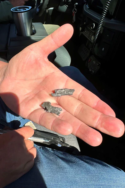 This photo provided by the California Highway Patrol shows shrapnel from live artillery that hit patrol vehicles during an Oct. 18, 2025, military celebration in San Diego.