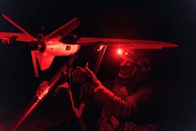 A soldier of the 127th Separate Territorial Brigade launches a drone to search for Russian attack drones at the front line in the Kharkiv region Saturday, March 14, 2026.
