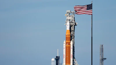 NASA's Artemis II SLS (Space Launch System) moon rocket with the Orion spacecraft slowly rolls back towards the Vehicle Assembly Building at the Kennedy Space Center, Feb. 25, 2026, in Cape Canaveral, Fla.