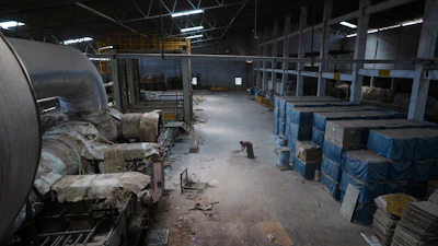 A worker sweeps the floor of a closed ceramics factory in Morbi,in the Indian state of Gujarat, Wednesday, April 8, 2026.