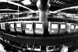 In this March 28, 1984, file photo, thousands of Apple Macintosh computers sit on double decked manufacturing lines.