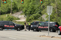 Police block a road near a chemical plant where a leak occurred Wednesday, April 22, 2026, in Institute, W.Va.
