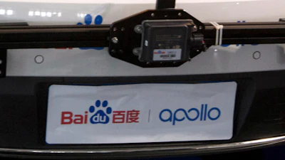 The logo for Baidu and Apollo autonomous driving platform is seen at the Baidu Create 2018 held in Beijing on July 4, 2018.