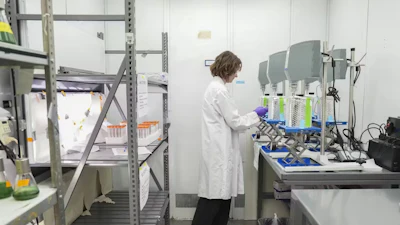 A scientist prepares samples while doing research on PFAS at a U.S. Environmental Protection Agency lab. Understanding of chemicals’ risks has been built on IRIS assessments.