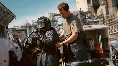 Soldiers and airmen from the Washington National Guard's 10th Homeland Response Force offer support to first responders following an implosion of a chemical tank at Nippon Dynawave pulp and paper mill on Thursday, May 28, 2026, in Longview, Wash.