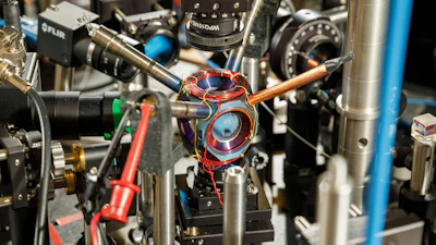 This device measures acceleration and rotation by shining lasers into small clouds of rubidium atoms.