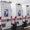 USPS delivery vans in Denver, March 23, 2026.