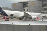 A Lufthansa 'Dreamliner ' aircraft lies on its nose in front of a terminal at Frankfurt Airport after the nose landing gear collapsed on Thursday, June 4, 2026 in Frankfurt, Germany.