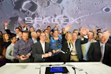 Gwynne Shotwell, President and COO of SpaceX, third from right, celebrates with colleagues during a bell ringing ceremony for the IPO of SpaceX at the Nasdaq MarketSite in New York, Friday, June 12, 2026, in New York.