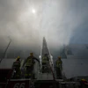 Firefighters fight a warehouse fire in the Boyle Heights neighborhood of Los Angeles, Sunday, June 21, 2026.