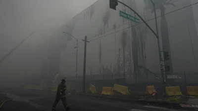Smoke from a warehouse fire fills the air in the Boyle Heights neighborhood of Los Angeles, June 21, 2026.