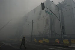 Smoke from a warehouse fire fills the air in the Boyle Heights neighborhood of Los Angeles, June 21, 2026.