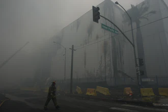 Smoke from a warehouse fire fills the air in the Boyle Heights neighborhood of Los Angeles, June 21, 2026.