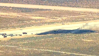 This image taken from video provided by KABC shows law enforcement responding to the scene of an aircraft crash, Monday, June 15, 2026, near Edwards Air Force Base, Calif.