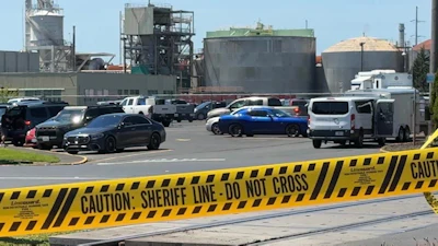 Yellow police tape is seen on May 27, 2026 outside the Longview, Wash. paper mill where a deadly chemical tank failure occurred.