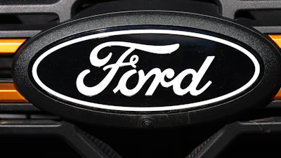 The company logo is shown on the grille of an unsold 2026 F-series pickup truck on the lot of a Ford dealership Sunday, Nov. 2, 2025, in Littleton, Colo.
