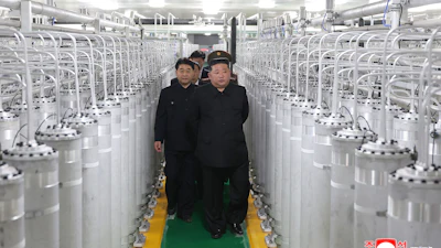In this photo provided by the North Korean government, its leader Kim Jong Un, front right, visits a new facility to produce nuclear bomb fuels at an undisclosed place in North Korea Wednesday, June 3, 2026. Independent journalists were not given access to cover the event depicted in this image distributed by the North Korean government. The content of this image is as provided and cannot be independently verified. Korean language watermark on image as provided by source reads: 'KCNA' which is the abbreviation for Korean Central News Agency.
