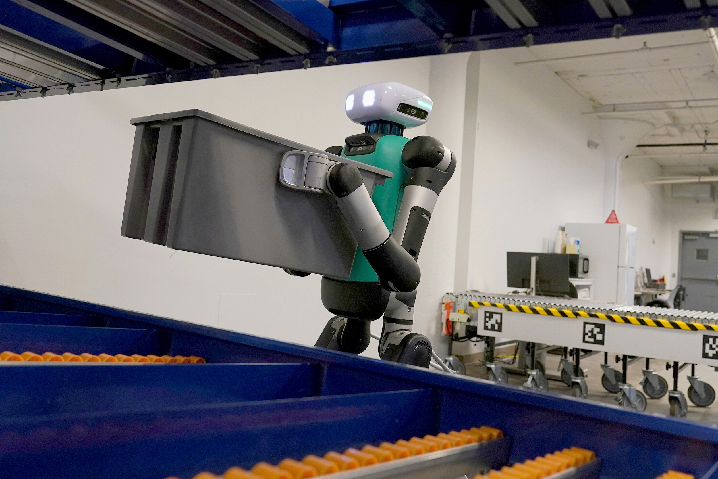 Agility Robotics' warehouse robot Digit performs maneuvers at the company's office in Pittsburgh on Aug. 16, 2023.