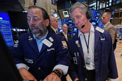 Specialist Michael Pistillo, left, and trader Sean Spain work on the floor of the New York Stock Exchange, Tuesday, June 16, 2026.