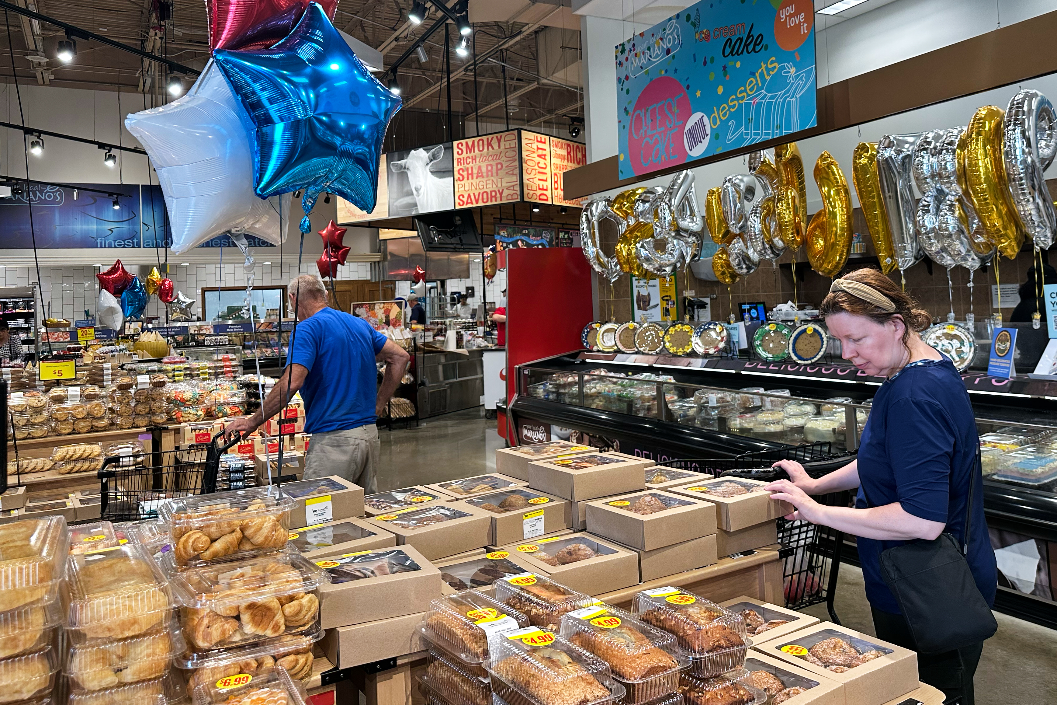 Customers shop at a grocery store in Chicago, June 25, 2026.