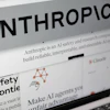 Pages from the Anthropic website and the company's logo are displayed on a computer screen in New York, Feb. 26, 2026.