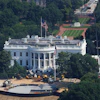 Construction workers continue designing a helipad for Marine One at the White House South Lawn, Wednesday, July 1, 2026, in Washington.