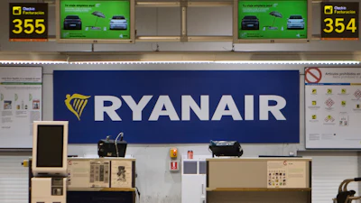The Ryanair desk is seen, Aug. 10, 2018, at the Barajas airport in Madrid, Spain.