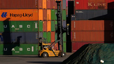 Shipping containers stacked at a depot in Johannesburg, South Africa, Aug. 1, 2025.