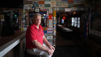 Bobby Kuchinsky, general manager of Half Shell Raw Bar, poses inside his restaurant in Key West, Fla., July 25, 2026.