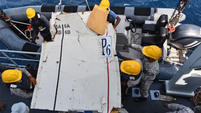 In this photo released by Pakistan Navy, Pakistan Navy personnel shift the wreckage of a cargo plane of the private carrier K2 Airways into a naval ship after recovering them from deep sea near Omara, a town some 360 kms. (220 miles) west of Karachi, Pakistan, Wednesday, July 8, 2026.