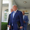 President Donald Trump arrives with Los Angeles Dodgers manager Dave Roberts and owner Mark Walter for an event to honor the 2025 World Series champions Los Angeles Dodgers in the Rose Garden of the White House, Thursday, July 23, 2026, in Washington.