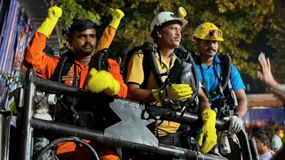 In this image provided by the Information and Public Relations Department, Government of Sikkim, rescue workers stand outside an under-construction tunnel at a hydropower project in Samardung village, about 40 kilometers (25 miles) from Gangtok, India, Wednesday, July 22, 2026.