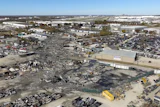 This photo provided by the National Transportation Safety Board shows UPS plane crash scene on Nov. 6, 2025 in Louisville, Ky.